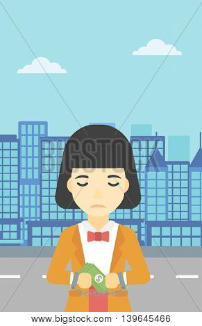 An asian  young business woman in handcuffs with money in hands on the background of modern city. Business woman handcuffed for crime. Vector flat design illustration. Vertical layout.