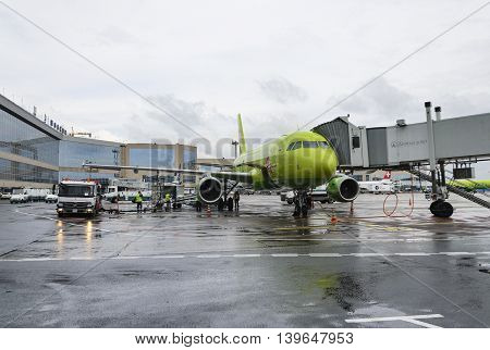 MOSCOW, RUSSIA - MAY 19, 2016: Airbus A319 S7 airlines refueling aircraft during preflight maintenance at the airport Domodedovo