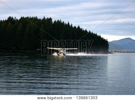 Seaplane landing near Kodiak City on Kodiak Island in Alaska