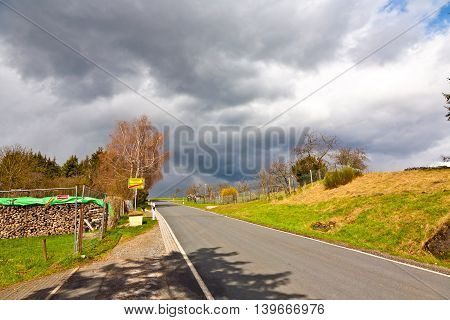 Street With Dark Clouds And Heavy Rain