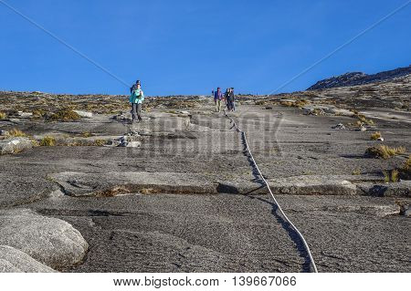 Ranau,Sabah Borneo-March 13,2016:Group of climbers move down to Laban Rata after succesfully completed conquering the summit of the majestic mountain Kinabalu,which the highest mountains in Asean.