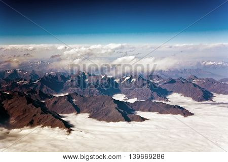 Beautiful View From The Aircraft To The Mountains Of The Himalaya On Chinese Tibetan Side Snow