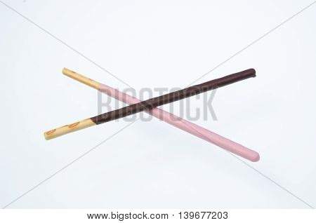 Japanese snack food biscuit stick strawburry and chocolate coated on white background