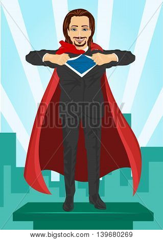 Young businessman dressed like a super hero and tearing his shirt off watching over city