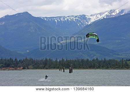 Kitesurfers riding in the Howe Sound in Squamish, Canada