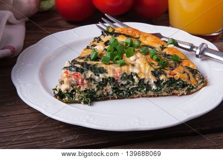Frittata With Spinach, Tomatoes And Cheese