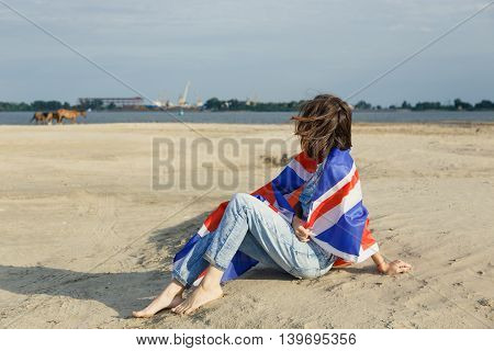 portrait girl the beach dawn she denim overalls white t-shirt British moisture