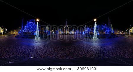 360 panorama of Avram Iancu Square at night lit up by Christmas decorations in Cluj-Napoca, Romania