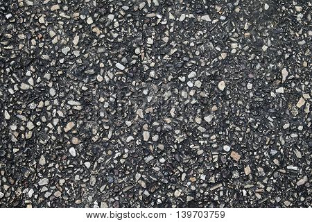 dark little rock concrete floor texture Asphalt road texture closeup surface Asphalt