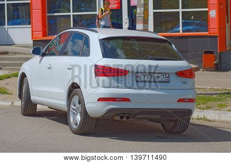 SARANSK, RUSSIA - JULY 19, 2016: White painted Audi Q3 parked in a city street.
