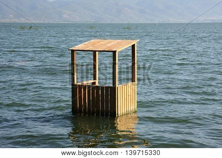 Flooded lifeguards cottage in Dojran lake in Macedonia