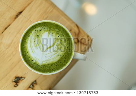 Hot Green Tea Set On A Wooden Table In A Coffeshop