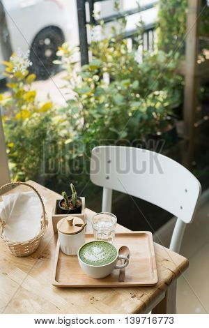 Hot Green Tea Set On A Wooden Table In A Coffeshop