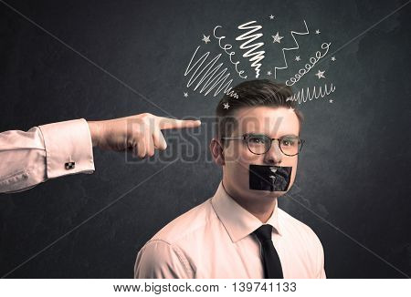 Caucasian business hand pointing at uncumprehended employee