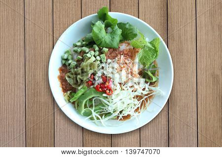 Local Thai foods of Rice Vermicelli is name KHANOM CHINspicy noodles with vegetable and hot soup.