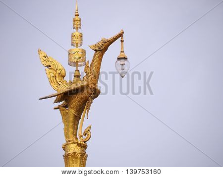 Golden swan electricity lamp post in Thailand.