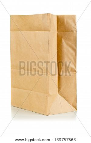 Clean brown paper bag from recycled paper on white background