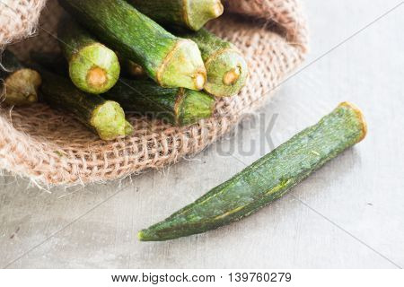 Healthy okra chips on clean background stock photo