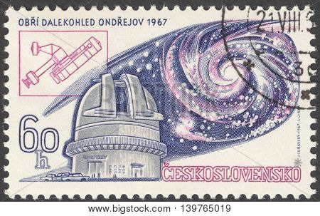 MOSCOW RUSSIA - JANUARY 2016: a post stamp printed in CZECHOSLOVAKIA shows Ondrejov Observatory and Universe devoted to the 13th International Astronomic Union Congress Prague circa 1967