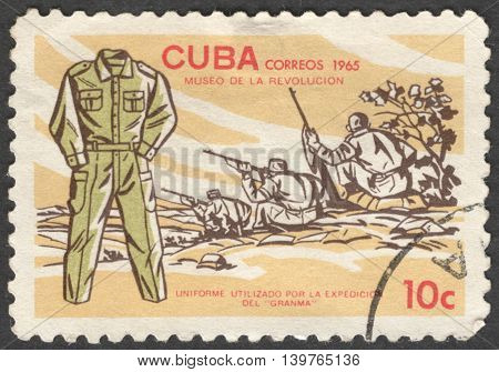 MOSCOW RUSSIA - JANUARY 2015: a post stamp printed in CUBA shows a soldier's uniform of Granma the series 