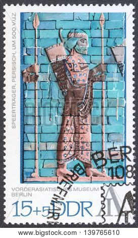 MOSCOW RUSSIA - CIRCA FEBRUARY 2016: a post stamp printed in DDR shows a spearman Persian the series 