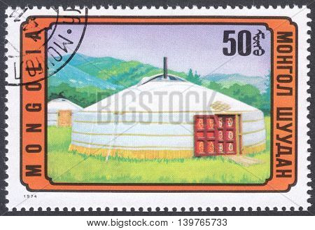 MOSCOW RUSSIA - CIRCA FEBRUARY 2016: a post stamp printed in MONGOLIA shows a traditional Mongolian building the series 