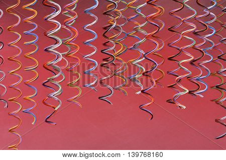 Colored telecommunication cables and wires on white background