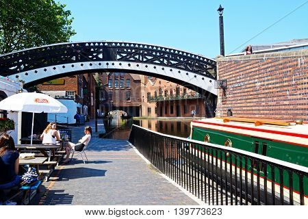 BIRMINGHAM, UNITED KINGDOM - JUNE 6, 2016 - Pavement cafe alongside the canal at Gas Street Basin Birmingham England UK Western Europe, June 6, 2016.
