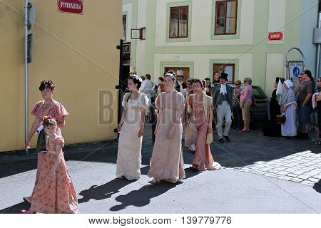 CESKY KRUMLOV, CZECH REPUBLIC - JUNE 18, 2016: Five-petalled Rose Festival on bystreet in Cesky Krumlov