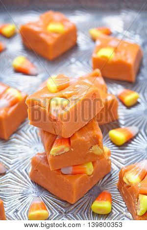 Delicious butterfinger fudge with candy corn and peanut butter