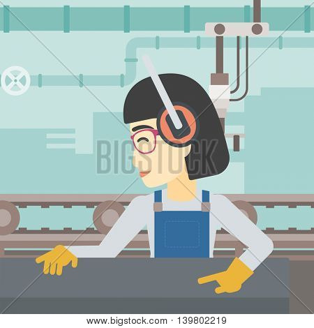 An asian woman working on metal press machine. Worker in headphones operating metal press machine at workshop. Woman using press machine. Vector flat design illustration. Square layout.