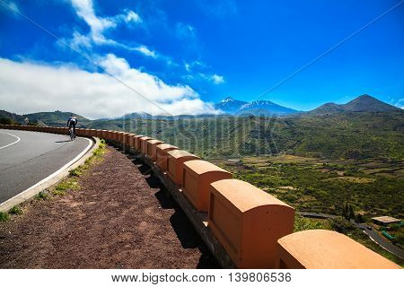 A Lone Cyclist On The Road Near Valle De Arriba