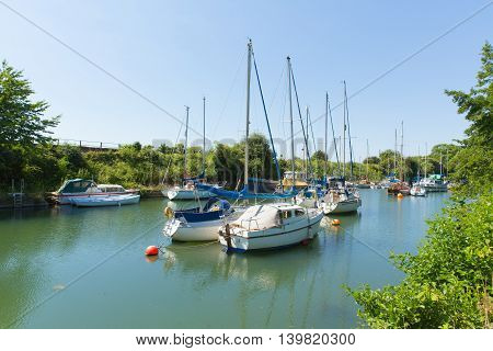 Boats in Lydney harbour Gloucestershire England uk west bank of the River Severn close to the Forest of Dean and Wye valley