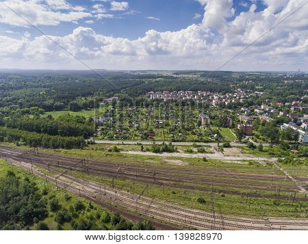 Depot With Many Railways At Day In City At Sunny Day. View From Above.