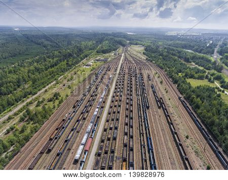 Depot With Many Railways At Day In City At Sunny Day. View From Above.