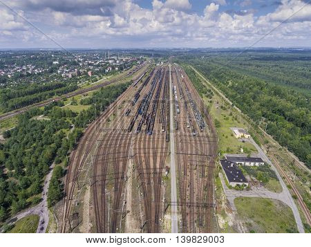 Depot With Many Railways At Day In City At Sunny Day. View From Above.