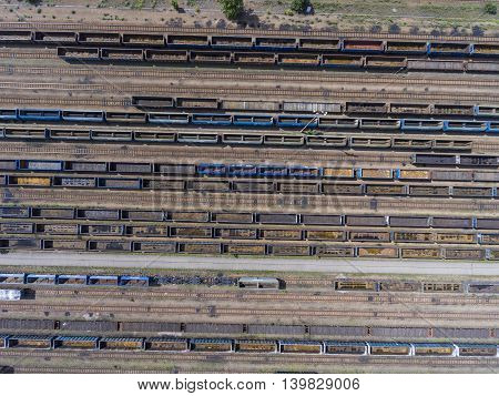 Depot With Many Railways At Day In City At Sunny Day. View From Above.