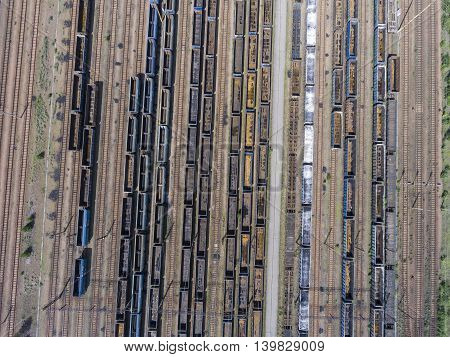 Depot With Many Railways At Day In City At Sunny Day. View From Above.