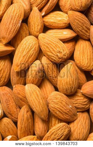 Close-Up on Almonds Nuts over a wooden table