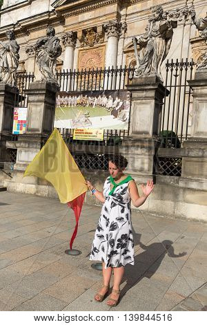 CRACOW POLAND - JULY 24 2016: Pilgrims of World Youth Day sing and dance on the St. Maria Magdalena Square in Cracow. Poland