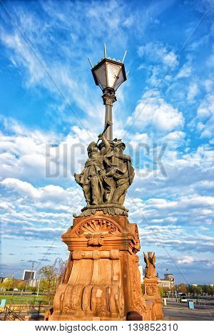 Street Lamp On Moltke Bridge Over Spree River In Berlin