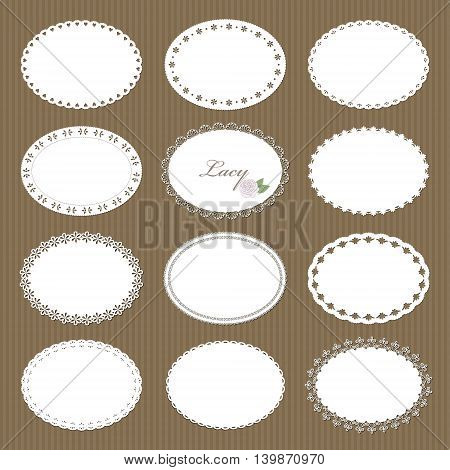 Oval lacy doilies big set on cardboard background.