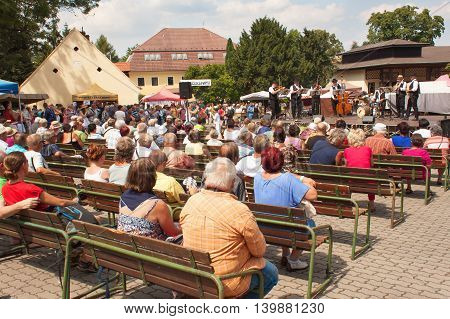 Buchlovice, Czech Republic, July 23, 2016: Celebration of garlic. Traditional farmers harvest celebrations of garlic. Agricultural sales markets. Sales of garlic, performances by folk ensembles.