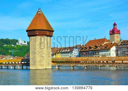 Morning view of Kapellbrucke in the historical city center. Luzern. Switzerland.