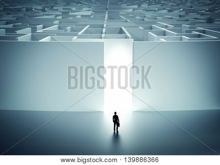 Businessman about to enter huge mysterious maze. Concept of challenge in life, career etc. 3D illustration