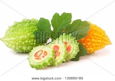 green and yellow momordica or karela with leaf isolated on white background.