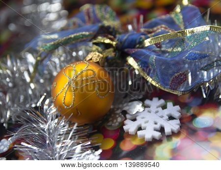 bright Christmas balls with reflections and colored tinsel