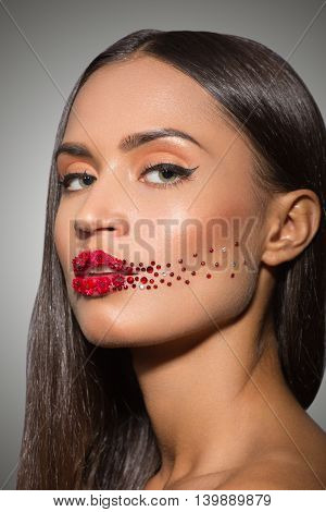 beauty woman face with creative make up red lips roses