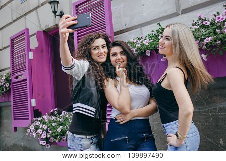 Girls walking around town, sit in cafes and pictures on phones