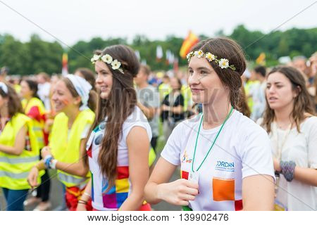 Poznan POLAND - JULY 24 2016: pilgrims praying dancing and singing during Days In Dioceses just before The World Youth Day in Krakow; WYD is a meeting of youth from all over the world